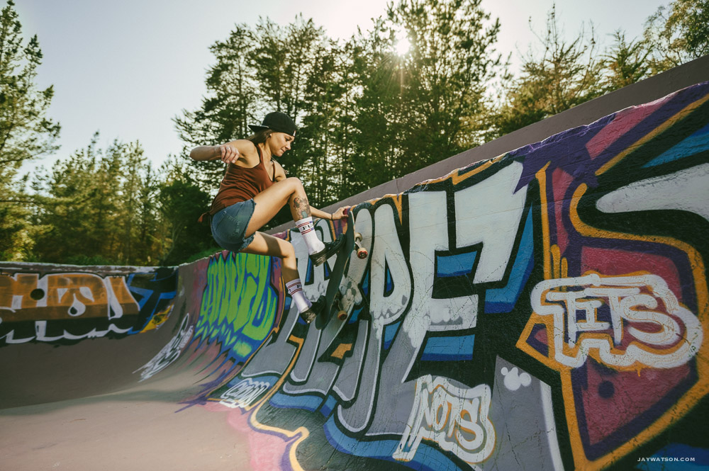 Jen skateboarding a California pool